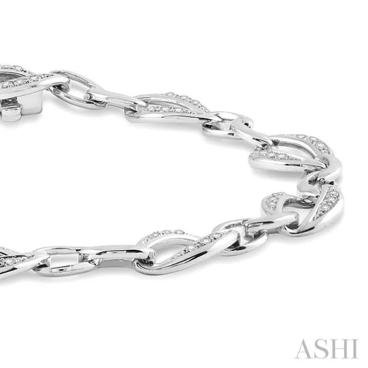 1/10 Ctw Round Cut Diamond Infinity Bracelet in Sterling Silver